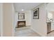 Bright hallway with tile floors and a console table at 36750 Us Highway 19 N # 15305, Palm Harbor, FL 34684