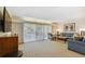 Living room featuring ample seating, large windows, and TV at 36750 Us Highway 19 N # 15305, Palm Harbor, FL 34684