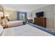 Bright bedroom with two double beds, a TV, and a work desk at 36750 Us Highway 19 N # 15305, Palm Harbor, FL 34684