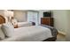 Comfortable bedroom with two twin beds and dresser at 36750 Us Highway 19 N # 15305, Palm Harbor, FL 34684