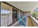 Relax on this balcony with a view of lush greenery at 36750 Us Highway 19 N # 15305, Palm Harbor, FL 34684