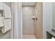 Clean bathroom with a shower and tile surround at 36750 Us Highway 19 N # 15305, Palm Harbor, FL 34684