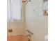 Bathroom featuring a tub and shower combination at 7979 Garden N Dr, St Petersburg, FL 33710