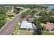 Aerial view showing the house, pool, and surrounding neighborhood at 7979 Garden N Dr, St Petersburg, FL 33710