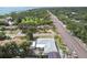 Aerial view of a home near a waterfront and main road at 7979 Garden N Dr, St Petersburg, FL 33710
