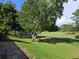 Landscaped view of the golf course from condo at 1036 Dunrobin Dr # D, Palm Harbor, FL 34684