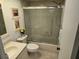 Clean bathroom with a shower/tub combo and updated vanity at 1036 Dunrobin Dr # D, Palm Harbor, FL 34684