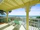Relaxing balcony overlooking the beach with lounge chairs at 20052 Gulf Blvd, Indian Shores, FL 33785