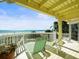 Spacious balcony with ocean views and comfortable seating at 20052 Gulf Blvd, Indian Shores, FL 33785