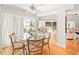 Casual dining area with glass-top table and ocean view at 20052 Gulf Blvd, Indian Shores, FL 33785