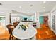 Bright kitchen with white cabinets and large island at 20052 Gulf Blvd, Indian Shores, FL 33785