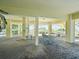Covered patio with outdoor seating and ocean views at 20052 Gulf Blvd, Indian Shores, FL 33785