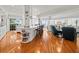 Open floor plan with hardwood floors, kitchen island, and ocean views at 20052 Gulf Blvd, Indian Shores, FL 33785