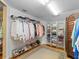 Spacious walk-in closet with ample shelving and hanging rods at 20052 Gulf Blvd, Indian Shores, FL 33785