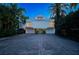 Beach house with double garages and driveway at 20052 Gulf Blvd, Indian Shores, FL 33785