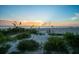 Stunning sunset over the ocean with beach access at 20052 Gulf Blvd, Indian Shores, FL 33785