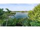 Stunning waterfront view with lush landscaping at 20052 Gulf Blvd, Indian Shores, FL 33785
