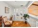 Hardwood floor hallway with French doors leading to main bedroom at 20052 Gulf Blvd, Indian Shores, FL 33785