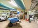Two-car garage with overhead storage and room for additional items at 20052 Gulf Blvd, Indian Shores, FL 33785