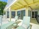 Outdoor balcony with lounge chairs and ocean views at 20052 Gulf Blvd, Indian Shores, FL 33785