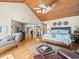 Spacious main bedroom with hardwood floors and sitting area at 20052 Gulf Blvd, Indian Shores, FL 33785