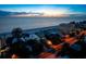 Night view of beach house, road, and ocean at 20052 Gulf Blvd, Indian Shores, FL 33785