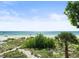 Spectacular view of beach from dune landscape at 20052 Gulf Blvd, Indian Shores, FL 33785