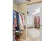 Large walk-in closet with ample hanging space and shelving at 20052 Gulf Blvd, Indian Shores, FL 33785