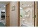 Clean bathroom with granite vanity and shower/tub combo at 36750 Us Highway 19 # 23-110, Palm Harbor, FL 34684