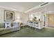 Living room with sofa and view of kitchen at 36750 Us Highway 19 # 23-110, Palm Harbor, FL 34684