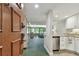 Bright and spacious entryway with kitchen and living room views at 36750 Us Highway 19 # 23-110, Palm Harbor, FL 34684