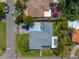 House with large backyard, single-car garage, and driveway at 5 158Th Ave, Redington Beach, FL 33708