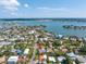 Aerial view showcasing the home's waterfront proximity at 5 158Th Ave, Redington Beach, FL 33708