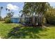 Charming single-story home with lush landscaping at 5 158Th Ave, Redington Beach, FL 33708