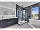 Spa-like bathroom with soaking tub, shower, and modern vanity at 2715 17Th N Ave, St Petersburg, FL 33713