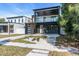 Stylish two-story house with dark exterior, and walkway at 2715 17Th N Ave, St Petersburg, FL 33713