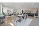 Open-concept dining area with modern light fixtures at 2721 17Th N Ave, St Petersburg, FL 33713