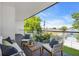 Relaxing balcony features outdoor seating with plush cushions and a view of the neighborhood at 2721 17Th N Ave, St Petersburg, FL 33713