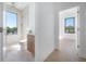 Bright bathroom featuring a shower and sink, complemented by light-colored floors at 2721 17Th N Ave, St Petersburg, FL 33713