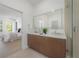Elegant bathroom featuring a double sink vanity, sleek fixtures, and a modern design aesthetic at 2721 17Th N Ave, St Petersburg, FL 33713
