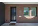 Close-up of the front door with modern design elements and a welcoming doormat at 2721 17Th N Ave, St Petersburg, FL 33713