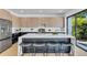 Modern kitchen with a marble island, stainless steel appliances, and sleek wooden cabinetry at 2721 17Th N Ave, St Petersburg, FL 33713