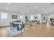 Spacious living and dining area with light wood floors and large windows, perfect for entertaining at 2721 17Th N Ave, St Petersburg, FL 33713