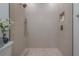 A modern shower with patterned tile, mosaic floor, and niche at 2721 17Th N Ave, St Petersburg, FL 33713