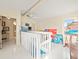 Bright loft area with white railings and artwork at 20051 Gulf Blvd, Indian Shores, FL 33785