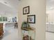 Elegant entryway with half-moon table and coastal decor at 20051 Gulf Blvd, Indian Shores, FL 33785