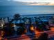 Night aerial view of beachfront home with ocean and street view at 20051 Gulf Blvd, Indian Shores, FL 33785