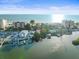 Aerial view of waterfront property with private dock and beach access at 20051 Gulf Blvd, Indian Shores, FL 33785