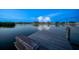 Private wooden dock extending over calm waters, ideal for boat owners at 20051 Gulf Blvd, Indian Shores, FL 33785