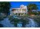 Charming beach house exterior with walkway and ocean views at 20051 Gulf Blvd, Indian Shores, FL 33785